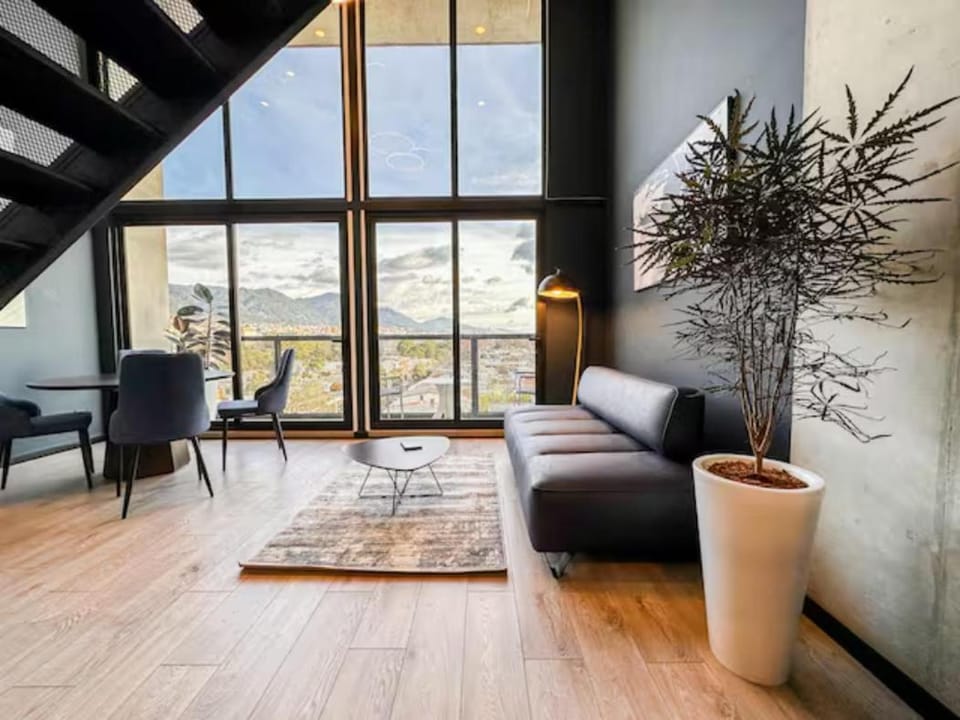 Skyline Suites - Elegant Living with Coworking & Scenic Views - NUJU RENTALS BOGOTA Apartment in Bogota