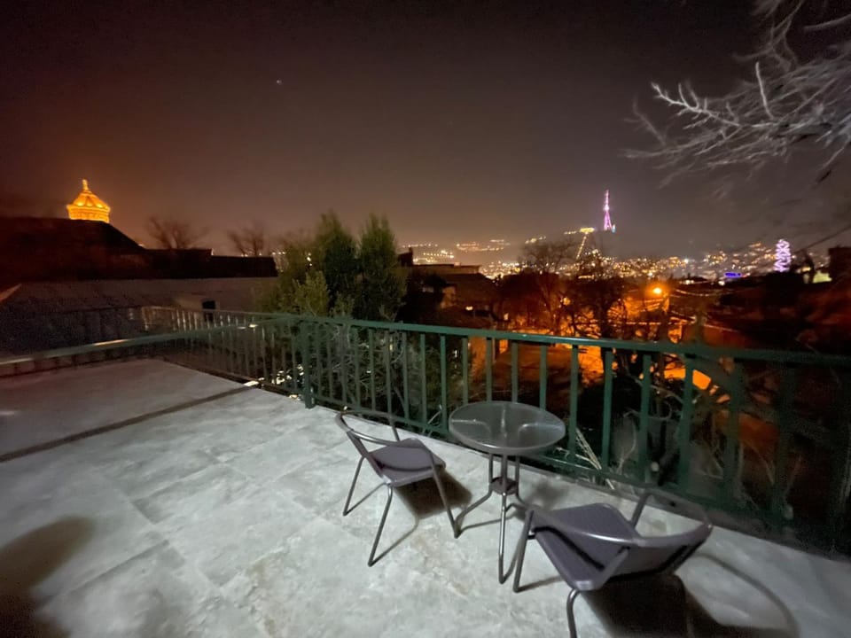 Property building, Patio, Night, Winter, View (from property/room), Balcony/Terrace, City view