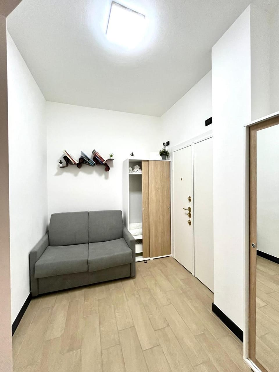 flat iron, hair dryier, towels, wardrobe