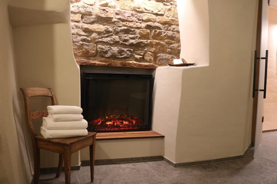 Bathroom, fireplace, towels