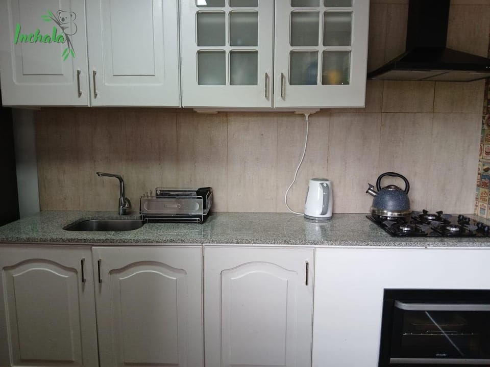 Kitchen or kitchenette, oven, stove