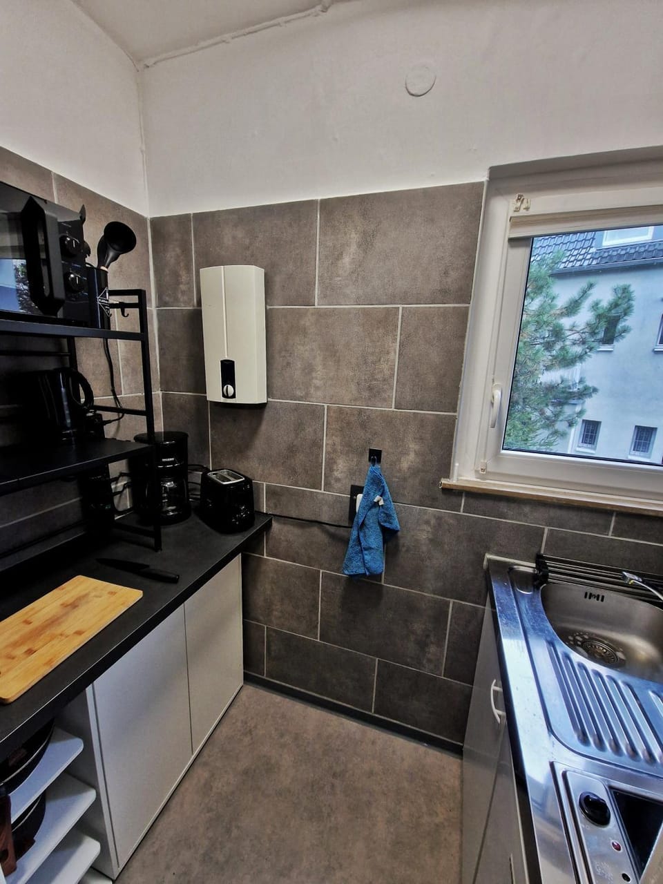 Kitchen or kitchenette, stove