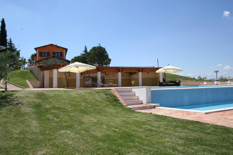 Property building, Day, Pool view, Swimming pool, sunbed