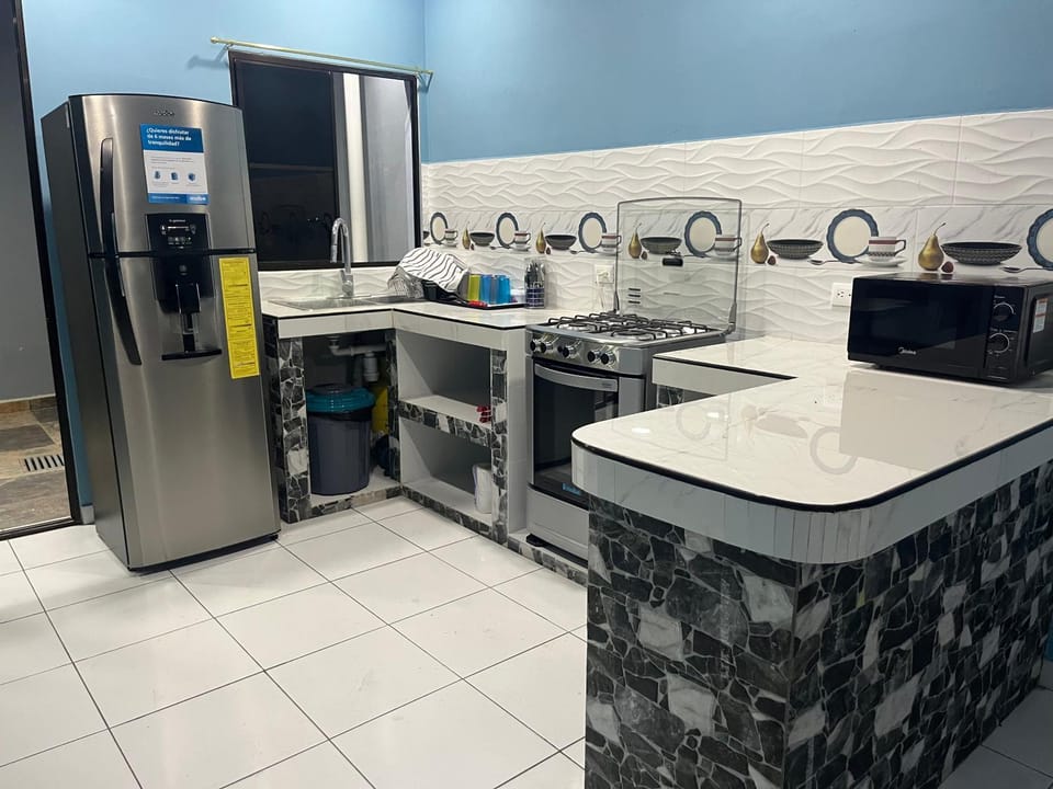 Kitchen or kitchenette, oven