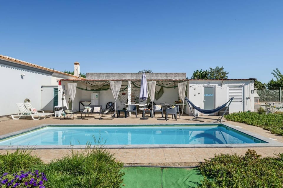 Property building, Living room, Swimming pool