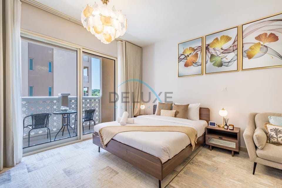 Bed, Living room, Seating area, Bedroom