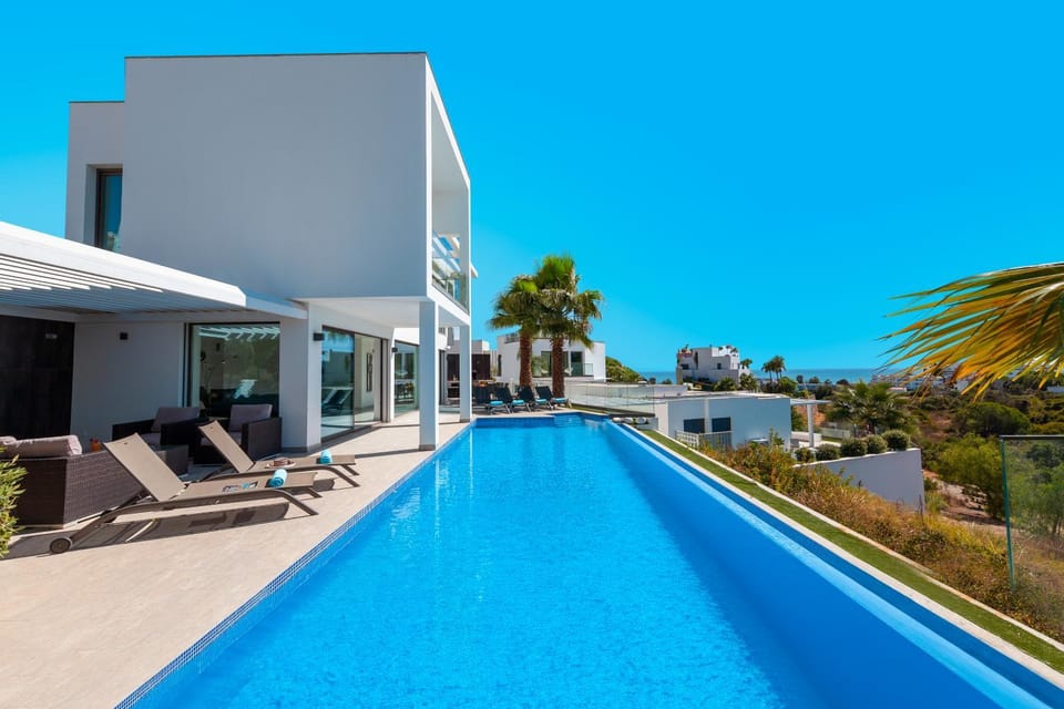 Property building, Day, Natural landscape, Pool view, Swimming pool, sunbed