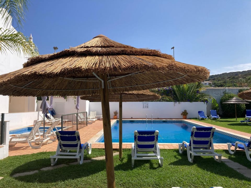 Swimming pool, sunbed