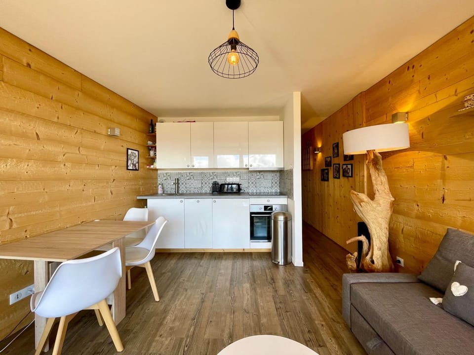 Living room, Dining area, oven, stove, toaster