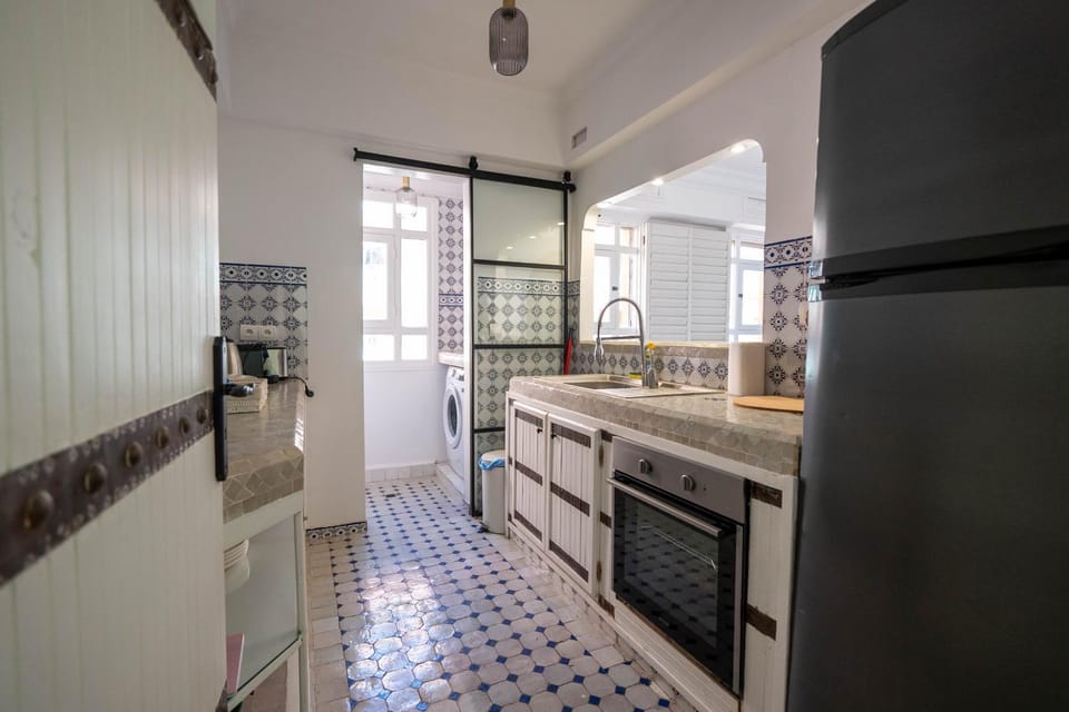 Kitchen or kitchenette, oven, stove, washing machine