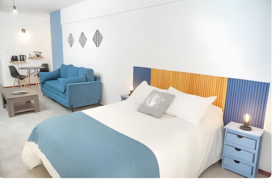 Bed, TV and multimedia, Living room, Photo of the whole room, Seating area, Bedroom