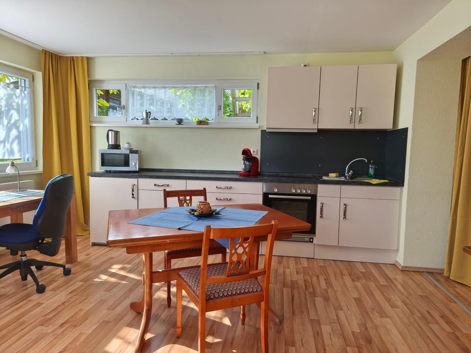 Kitchen or kitchenette, Seating area, Dining area, oven, stove