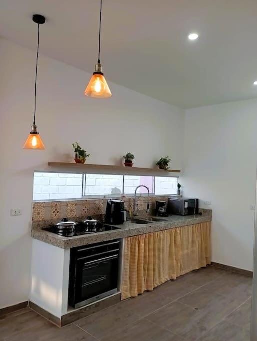 CycIoneda House House in Piura