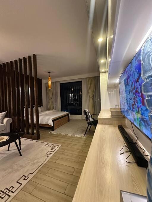 Communal lounge/ TV room, Bed, TV and multimedia, Living room, Photo of the whole room, Seating area, Evening entertainment