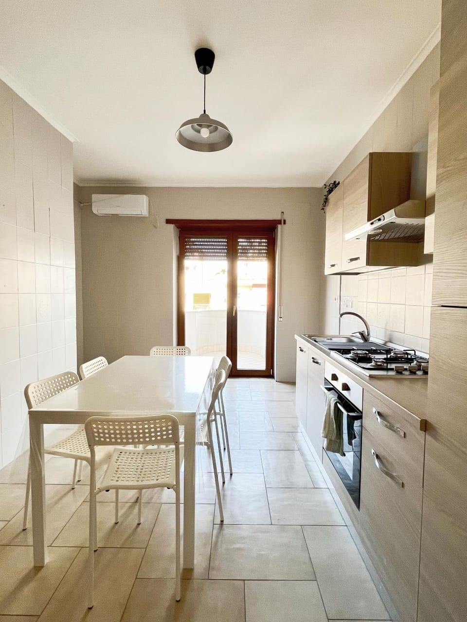 Kitchen or kitchenette, Dining area, oven, stove, air conditioner