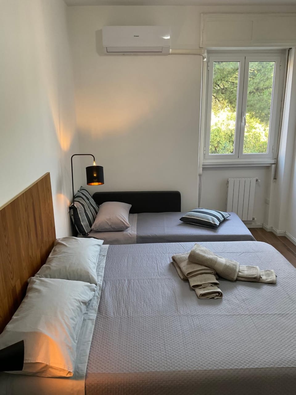 Bed, Photo of the whole room, Bedroom, towels, air conditioner