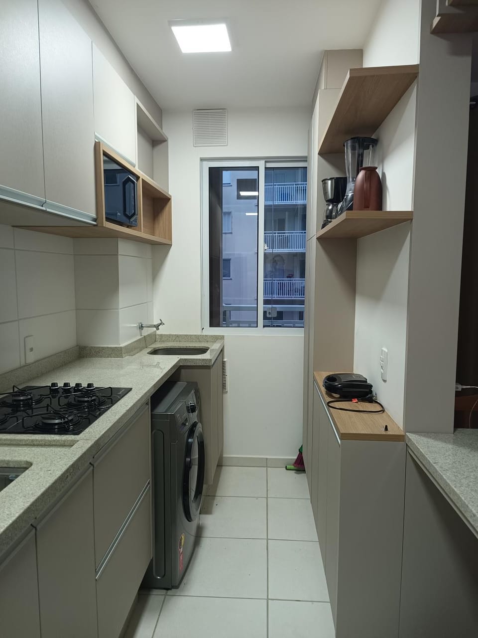 Kitchen or kitchenette, washing machine