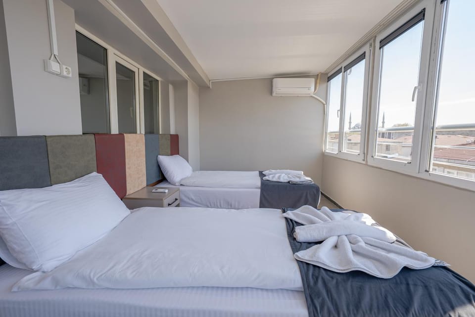 Bed, Bedroom, towels, air conditioner