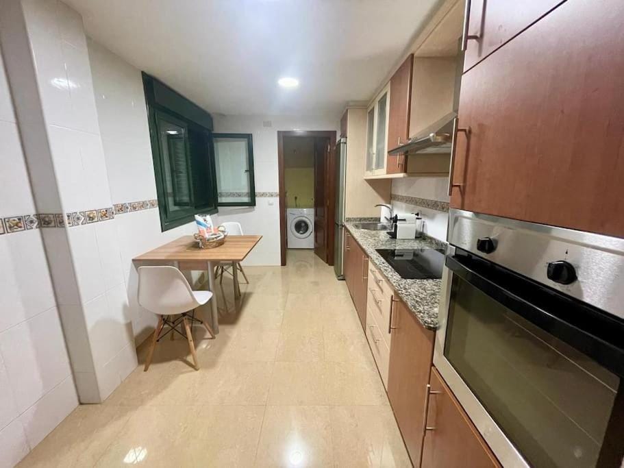 Kitchen or kitchenette, oven, stove