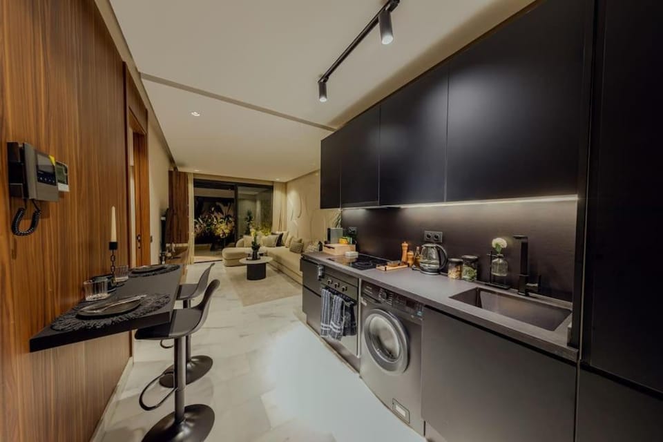 Coffee/tea facilities, Kitchen or kitchenette, Living room, Seating area, minibar, toaster, washing machine