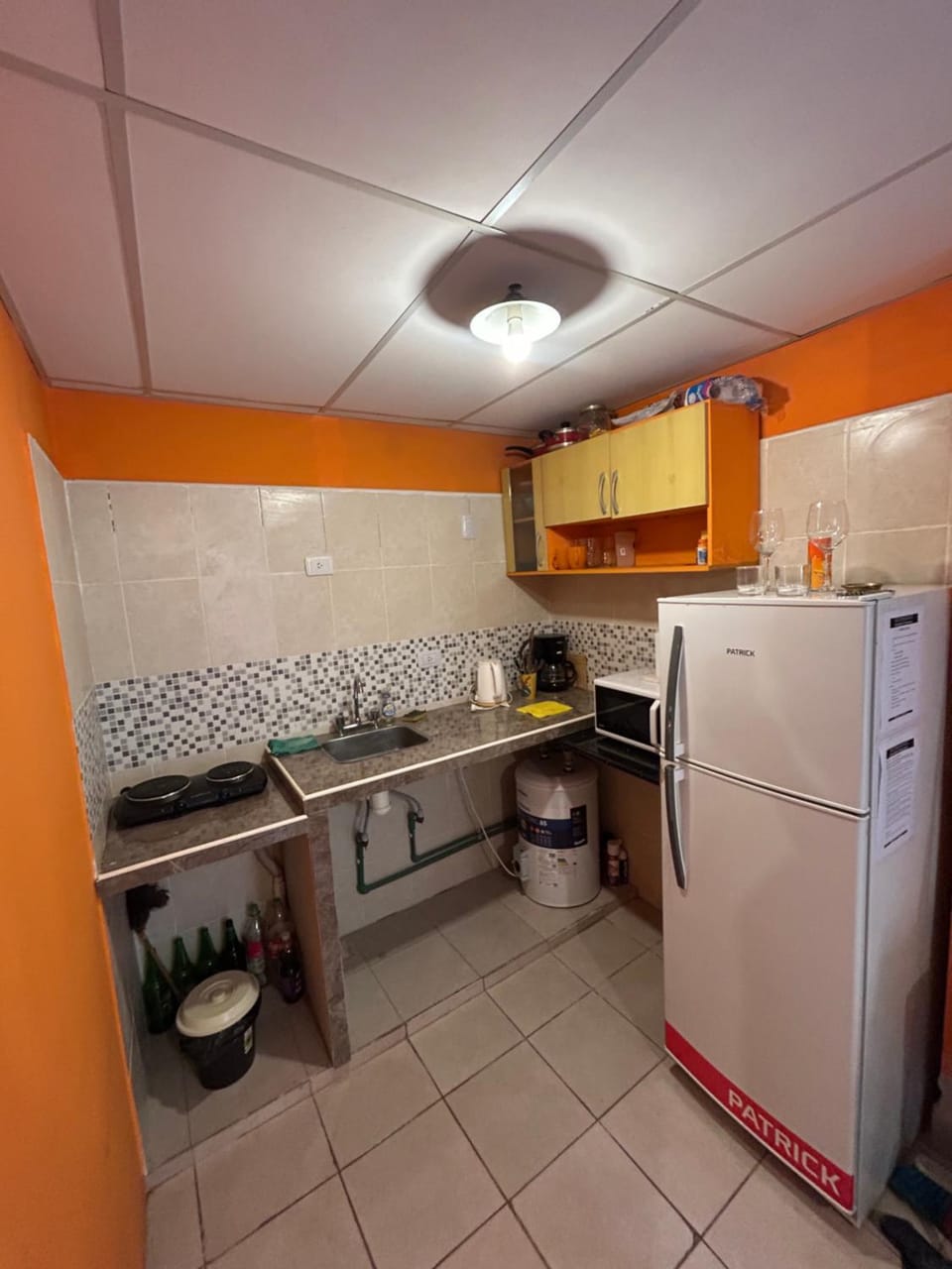 Kitchen or kitchenette, oven, stove