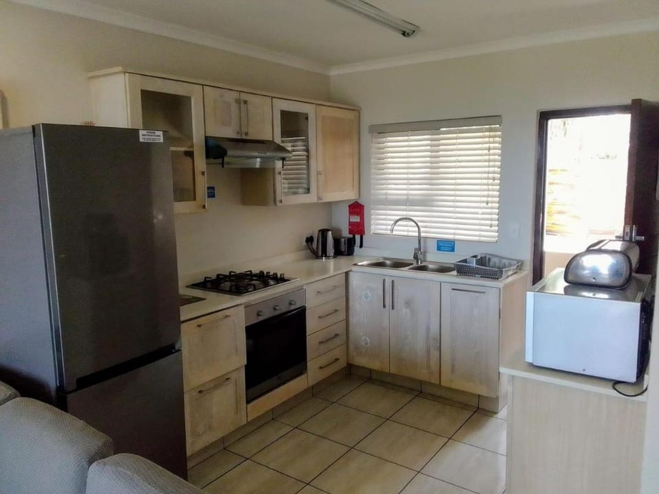 Kitchen or kitchenette, oven, stove, toaster