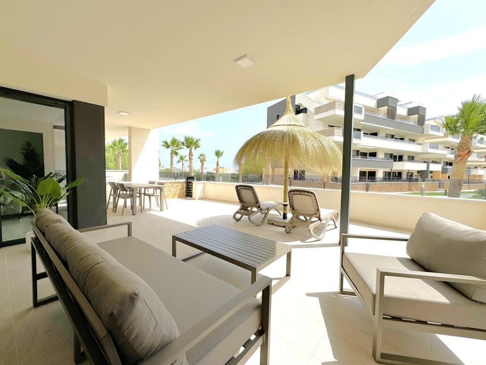 View (from property/room), Balcony/Terrace, Seating area, Garden view, Pool view, Sunrise