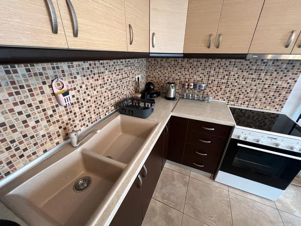 Kitchen or kitchenette, stove