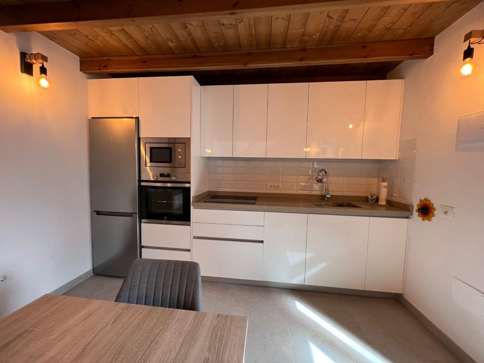 Kitchen or kitchenette, oven