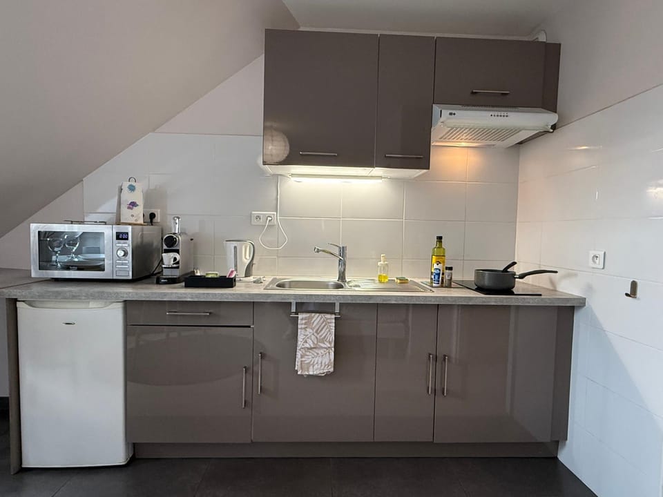 Kitchen or kitchenette, stove