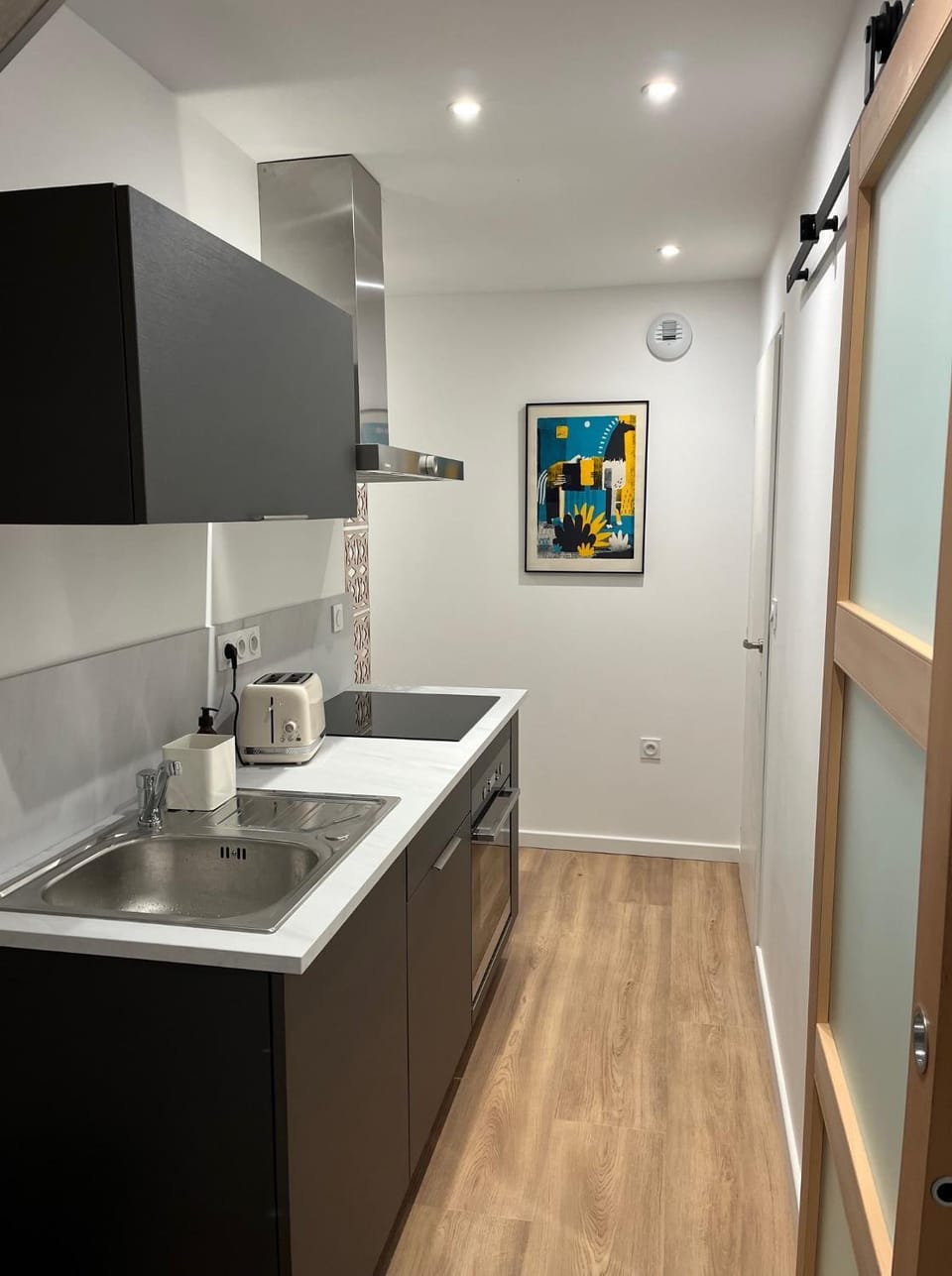 Kitchen or kitchenette, oven, stove