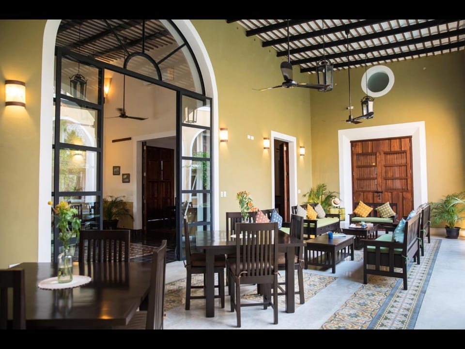 Property building, Living room, Seating area, Dining area