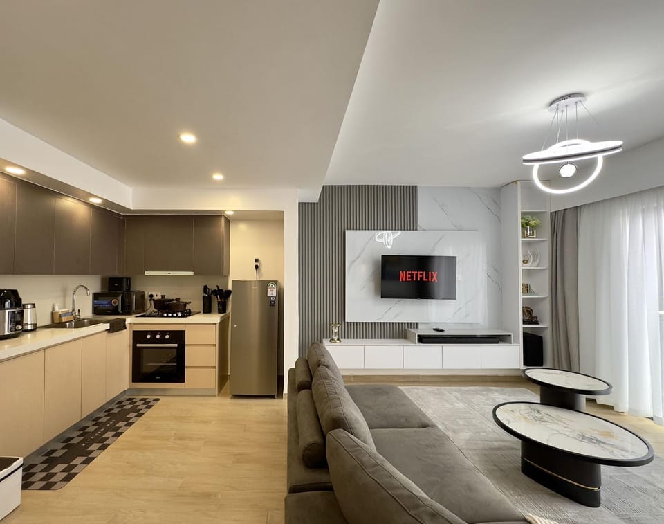 TV and multimedia, Coffee/tea facilities, Kitchen or kitchenette, Living room, Seating area, oven, stove, toaster