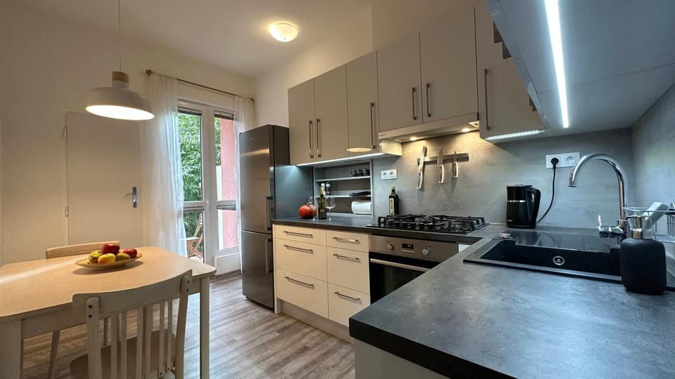 Kitchen or kitchenette, oven, stove