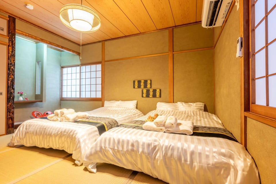 Bed, Photo of the whole room, Bedroom, towels, air conditioner
