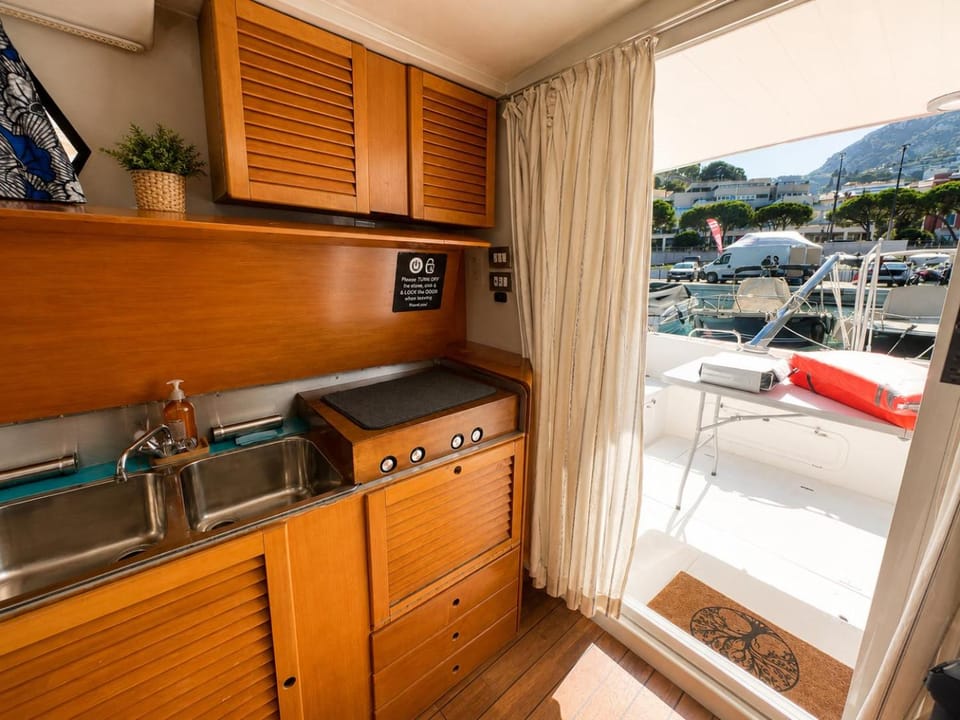 Unique Overnight Stay on the Water at the Port of Docked boat in Monaco
