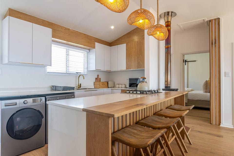 Kitchen or kitchenette, dishwasher, stove, washing machine, dryer