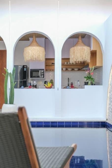 Kitchen or kitchenette, Seating area, Dining area, Pool view, Swimming pool