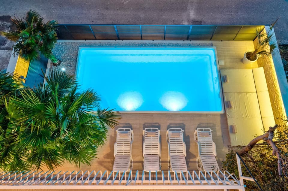Night, Pool view, Swimming pool, Swimming pool, sunbed