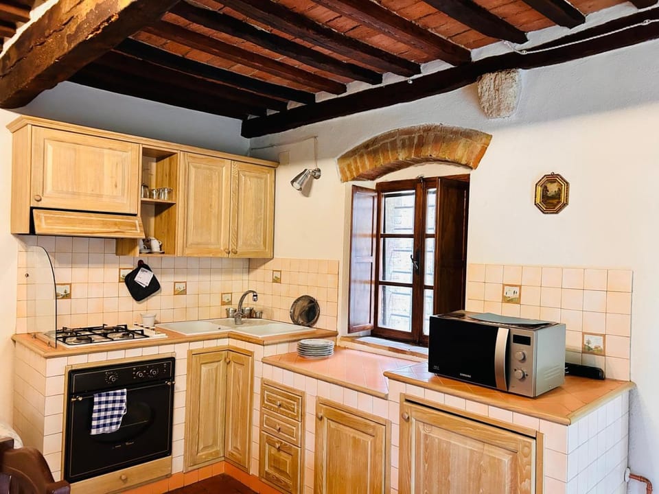 Kitchen or kitchenette, stove