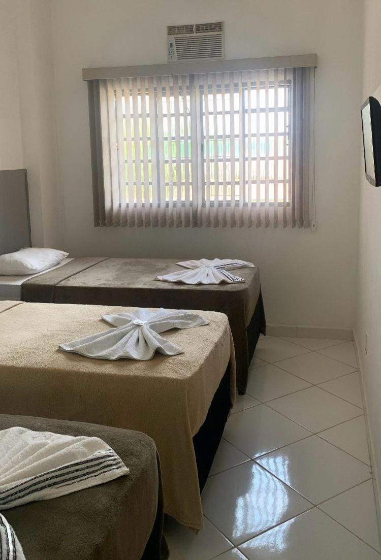Bed, TV and multimedia, Bedroom, towels, air conditioner