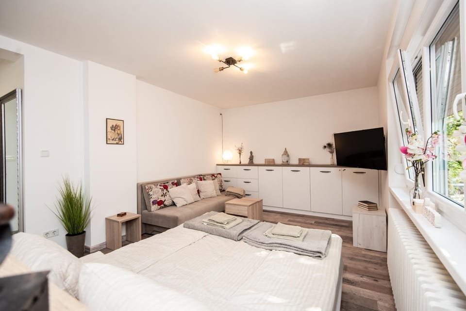 Bed, Living room, Seating area
