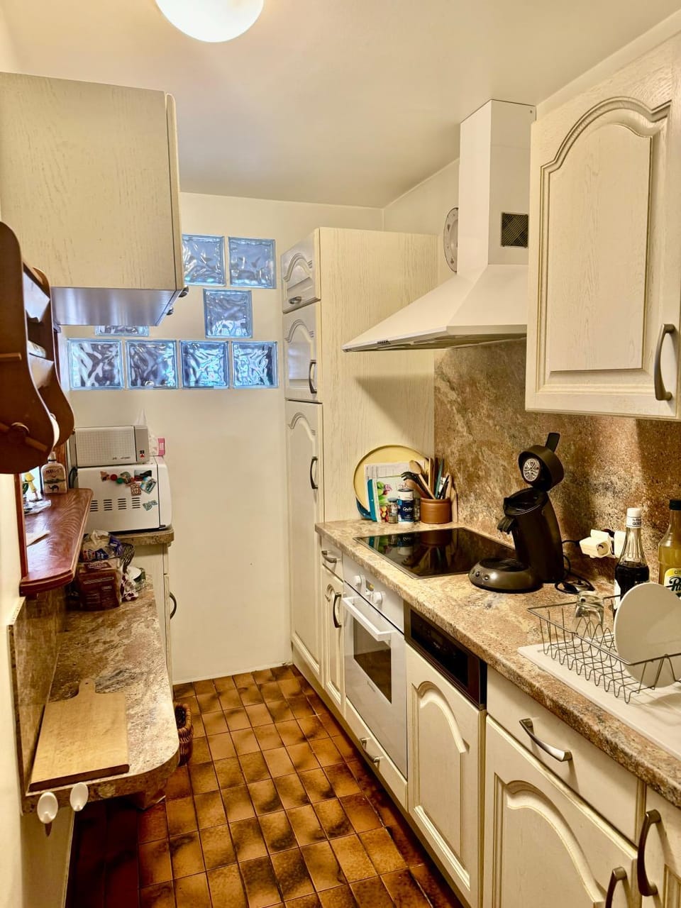 Kitchen or kitchenette, dishwasher, oven, stove, toaster