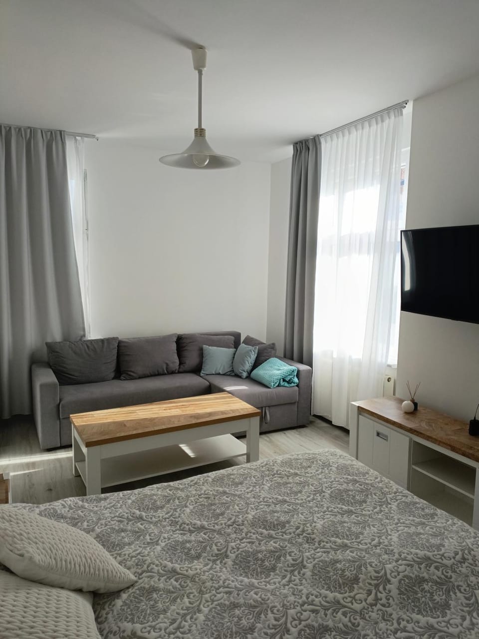 Bed, Living room, Seating area, Bedroom