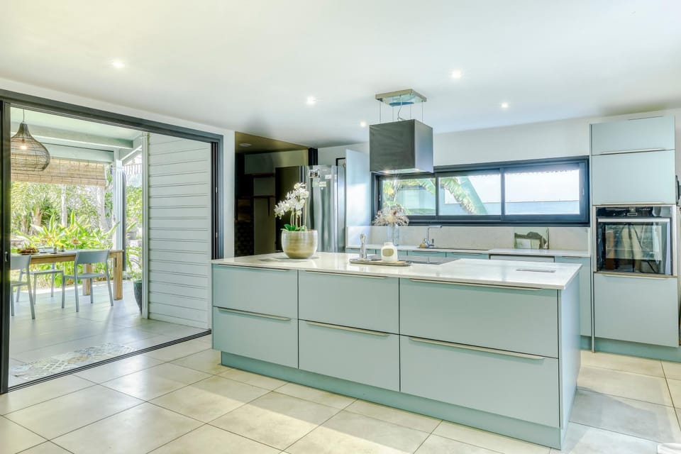 Kitchen or kitchenette, dishwasher, oven, stove