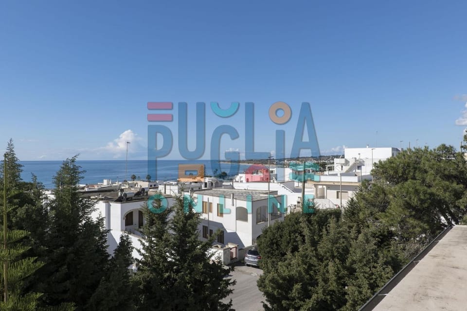 Property building, Nearby landmark, Day, Natural landscape, Text overlay, Sea view, Street view