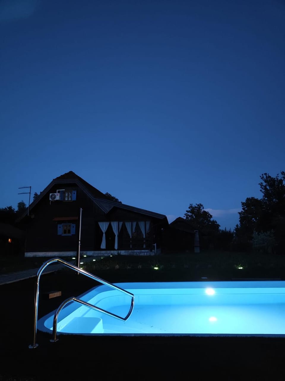 Night, Pool view, Swimming pool, sunbed