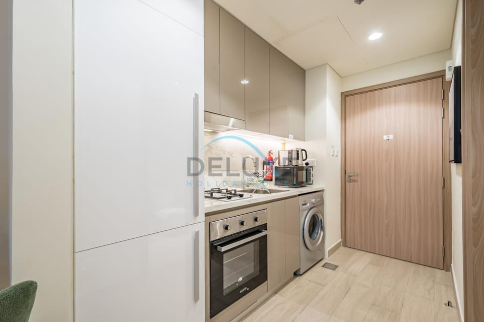 microwave, oven, stove, washing machine, kitchen