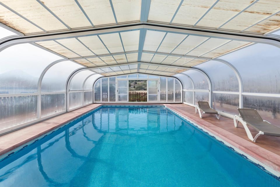 Property building, Living room, Swimming pool