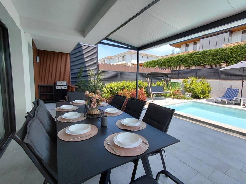 Patio, Day, Pool view